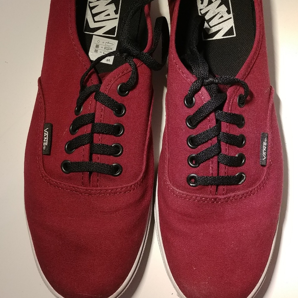 Maroon and black lo pro skate vans